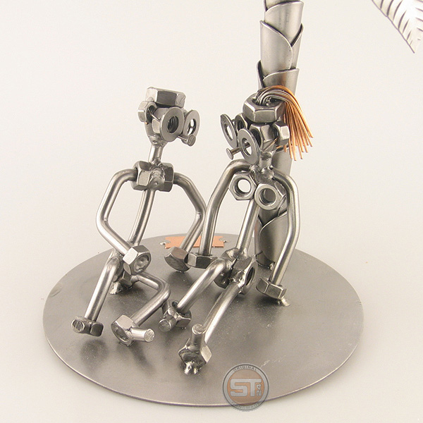Steelman and a Steelgirl on a Sunset Beach metal art figurine