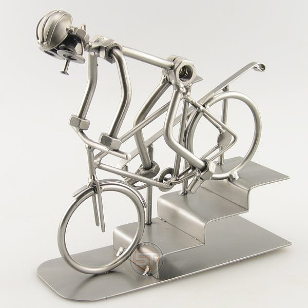 Steelman on a Mountain Bike going down a few steps metal art figurine