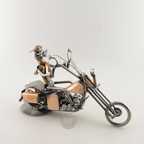 Steelman on a Copper Chopper Motorcycle metal art figurine