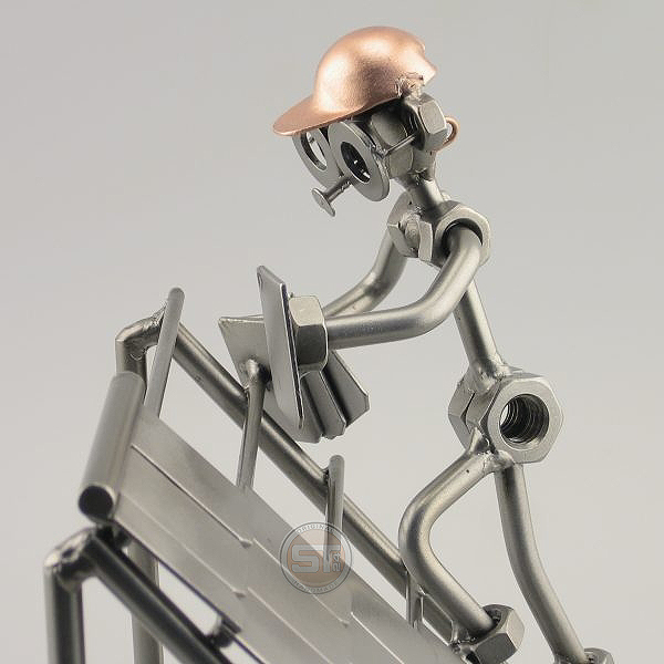 Steelman roofer is laying shingles on the roof metal art figurine