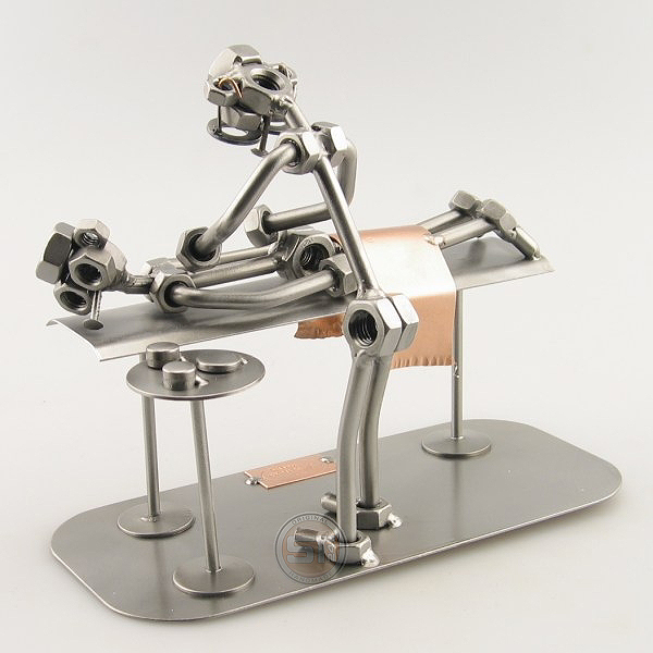 Steelman Masseur kneading the back of a patient metal art figurine