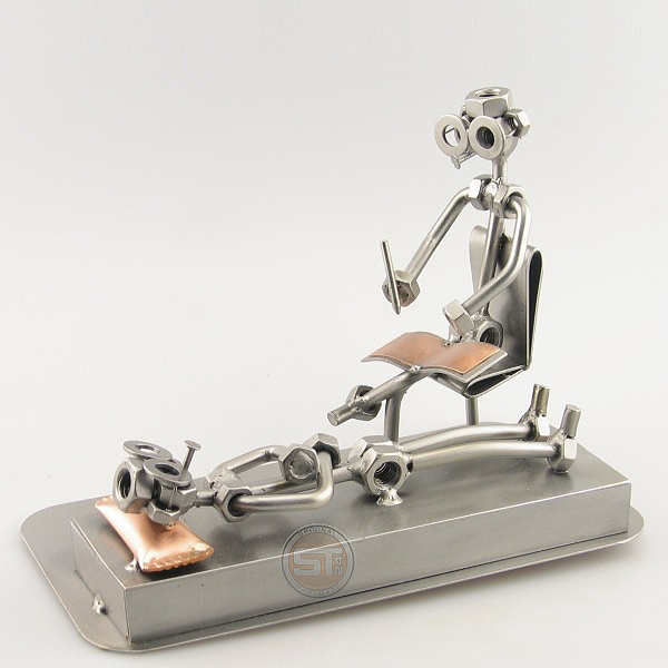 Steelman Psychologist with a patient metal art figurine