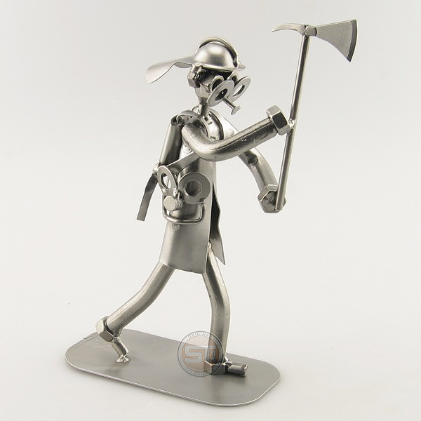 Steelman Fireman holding an Axe metal art figurine