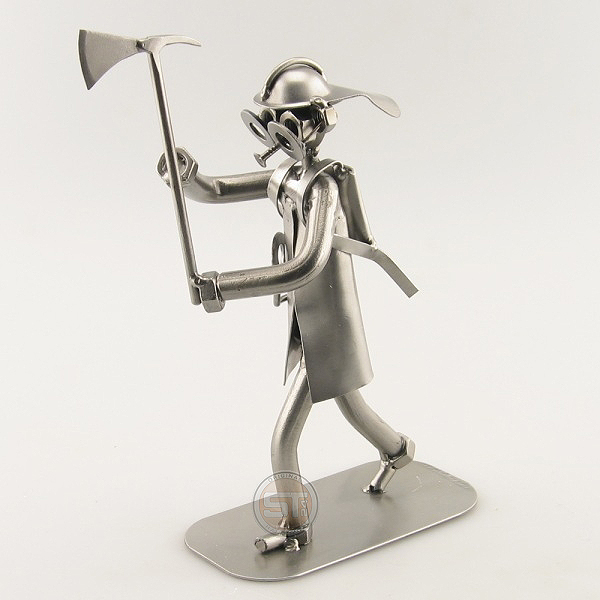 Steelman Fireman holding an Axe metal art figurine