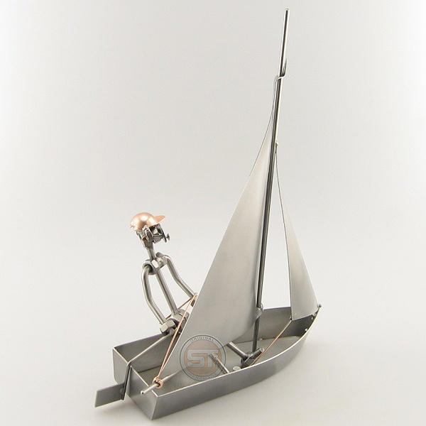 Steelman Sailor on a sailboat metal art figurine