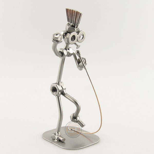 Steelman Singer in a mohawk holding a microphone metal art figurine