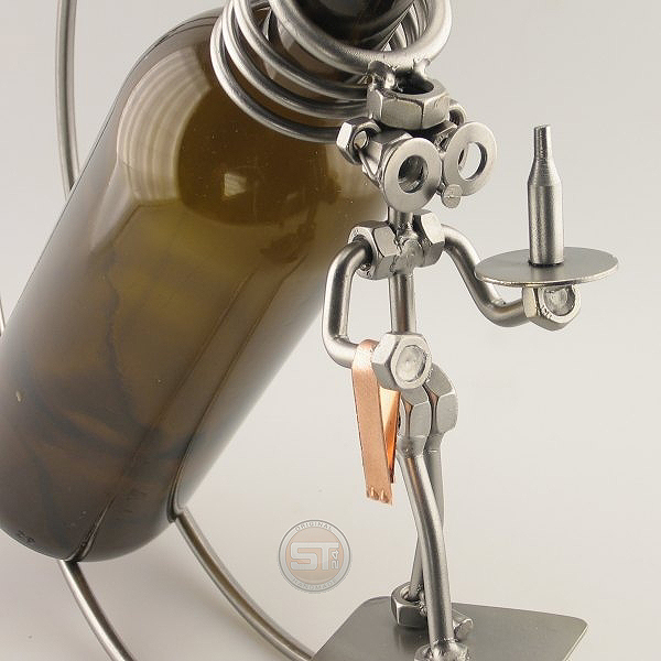 Steelman serving wine with a Wine Server metal art