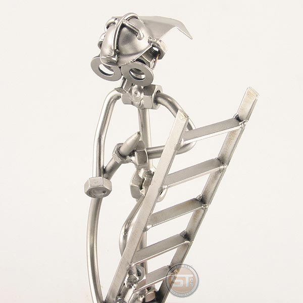 Steelman Fireman holding a hose climbing a Ladder metal art figurine