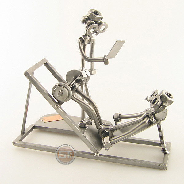 Steelman Fitness Trainer assisting a client metal art figurine