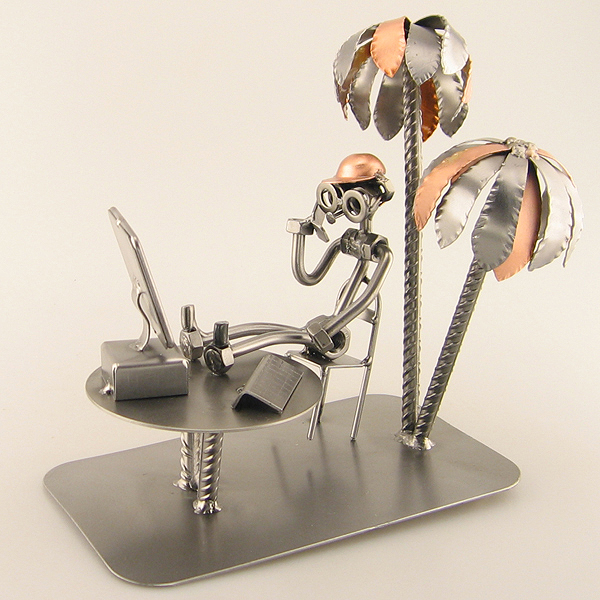 Steelman in a beach office under palm trees metal art figurine