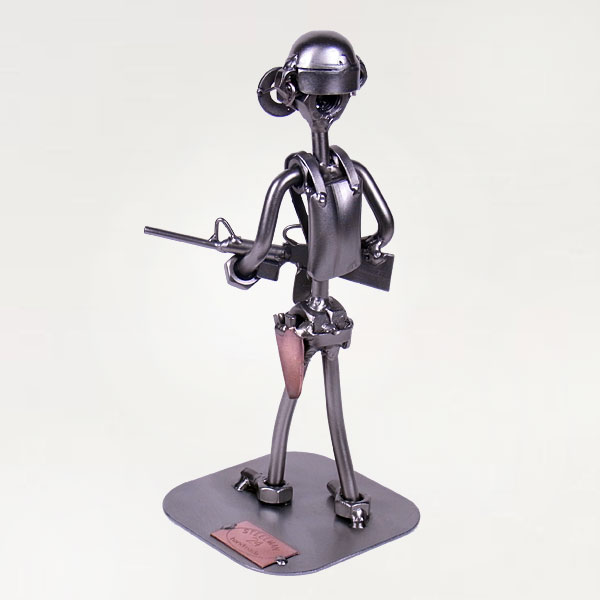 Steelman Soldier holding a gun metal art figurine