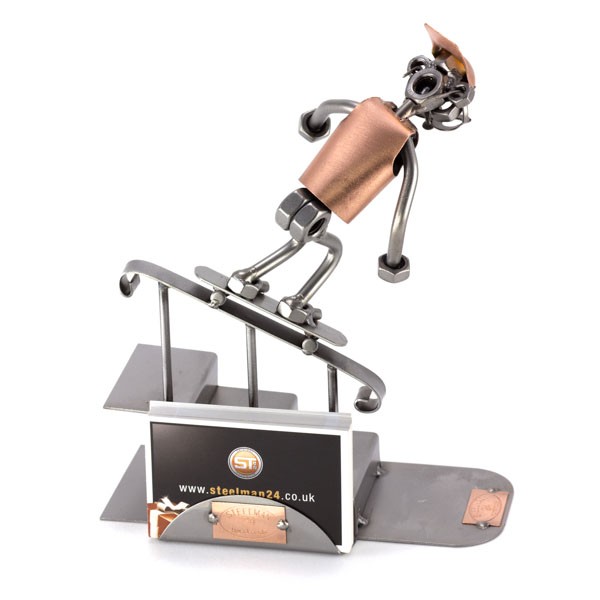 Steelman Skateboarder Grinding down a rail metal art figurine with a Business Card Holder