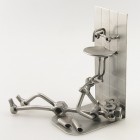 Steelman Plumber repairing under the sink metal art figurine with a Desk Organizer