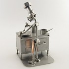 Steelman Cook frying metal art figurine with a Paper Towel Holder