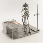 Steelman Biologist peering through the Microscope metal art figurine