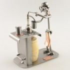 Steelman Cocktail Maker mixing a cocktail in a bar table with two bar stools metal art figurine