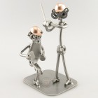 Steelman holding a racket playing tennis metal art figurine