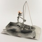 Steelman Fisherman reeling a fish metal art figurine