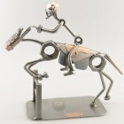 Steelman riding a galloping horse metal art statue