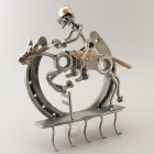 Steelman riding a galloping horse metal art statue