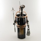 Steelman Diver diving near a fish and a reef metal art figurine