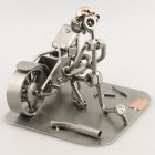 Steelman fixing an engine with a wrench metal art figurine