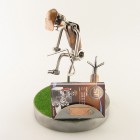 Steelman playing golf metal art figurine