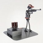 Steelman taking cover in a Paintball Game metal art figurine