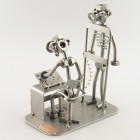 Steelman Pediatrician with a little patient metal art figurine