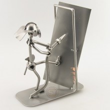 Steelman Fireman holding a hose while knocking down a door metal art figurine