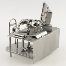 Steelman sleeping on his office desk metal art figurine