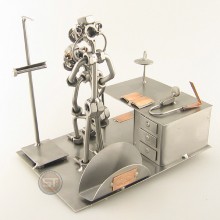 Steelman Doctor with a patient metal art figurine with a Business Card Holder