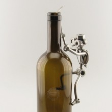 Steelman Mountaineer climbing to the top of a bottle of wine metal art figurine