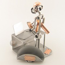 Steelman Engineer evaluating his project metal art figurine with a Business Card Holder