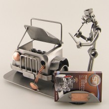 Steelman going over the damages on a totaled car metal art figurine with a Business Card Holder