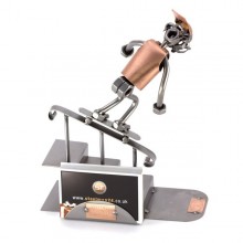 Steelman Skateboarder Grinding down a rail metal art figurine with a Business Card Holder