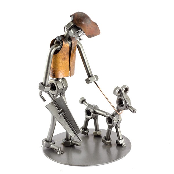 Steelman with his dog on a leash holding an umbrella metal art figurine